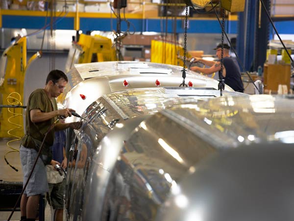 Craftsmen painstakingly craft each and every Airstream that rolls off the line in Ohio. Photo courtesy of Popular Mechanics.