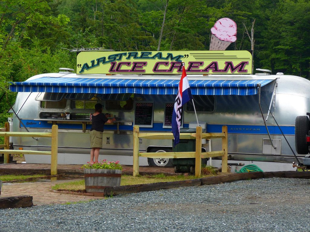 A vintage Airstream that doubles as an ice cream stand in New Hampton, NH proves the popularity of Airstreams among creative businesses. Photo by Flickr user Rusty Clark.